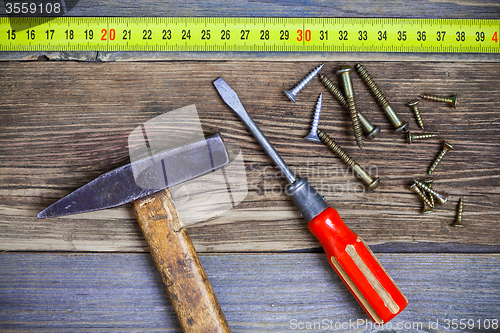 Image of old locksmith tools and screws