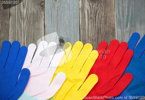Image of multicolored construction gloves