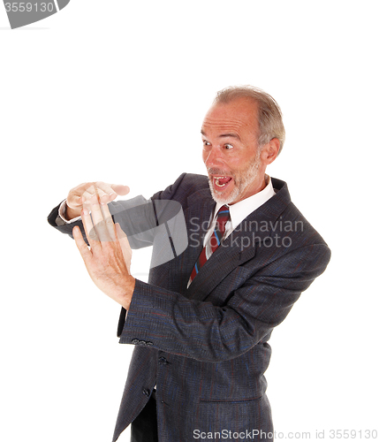 Image of Happy businessman giving sign with hands.