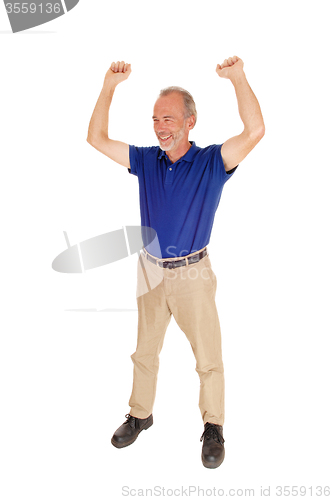 Image of Happy middle age man standing.