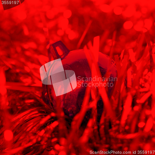 Image of Christmas bauble and tinsel