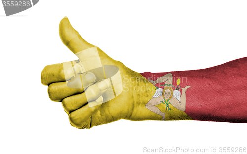 Image of Old woman with arthritis giving the thumbs up sign