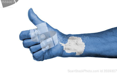 Image of Old woman with arthritis giving the thumbs up sign