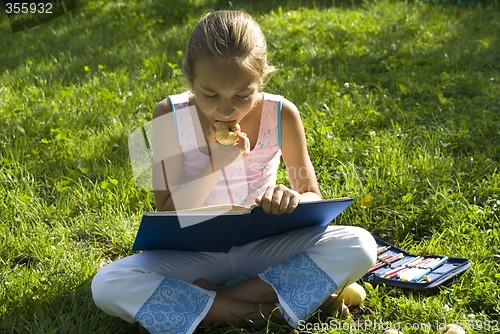 Image of The girl draws on a meadow II