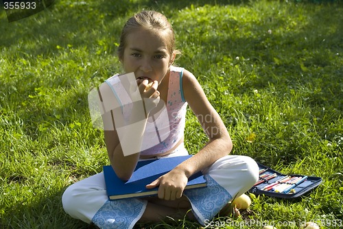 Image of The girl draws on a meadow III