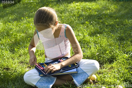 Image of The girl draws on a meadow IV