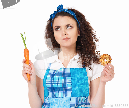 Image of Girl with carrot and cookie