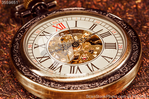 Image of Close up on vintage clock