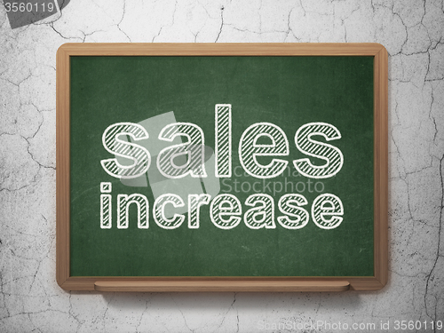 Image of Advertising concept: Sales Increase on chalkboard background