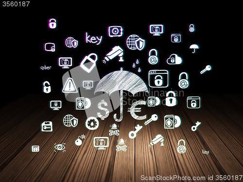Image of Security concept: Money And Umbrella in grunge dark room