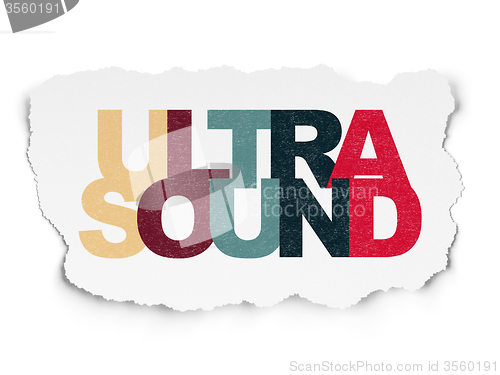 Image of Health concept: Ultrasound on Torn Paper background