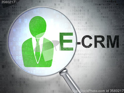 Image of Finance concept: Business Man and E-CRM with optical glass