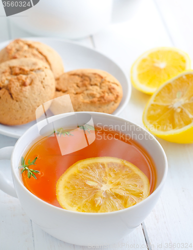 Image of Fresh tea with lemon in the white cup