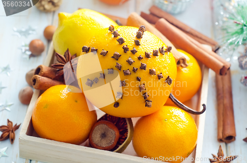 Image of Fresh oranges and cinnamon for christmas