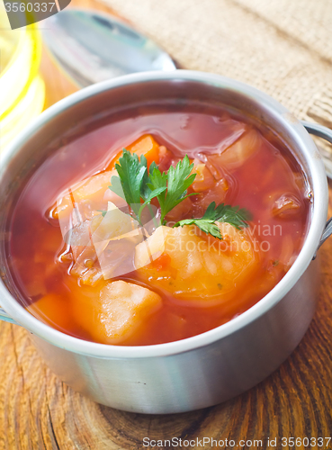 Image of Delicious veal stew soup with meat and vegetables 