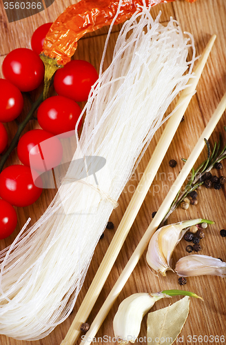 Image of raw rice noodle and aroma spice