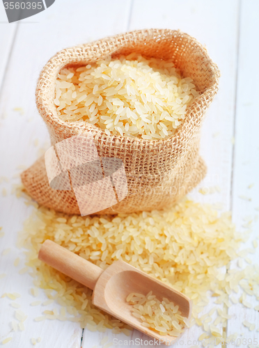 Image of Raw rice on the table, portion of the raw rice