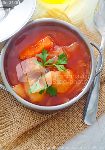 Image of Delicious veal stew soup with meat and vegetables 