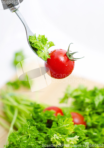 Image of Fresh tomato cherri and green salad