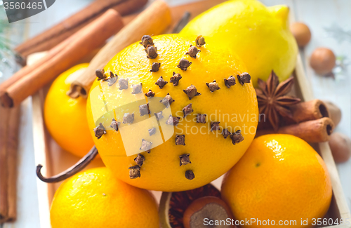 Image of Fresh oranges and cinnamon for christmas