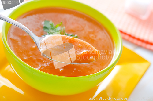 Image of Fresh soup from pumpkin in the green bowl