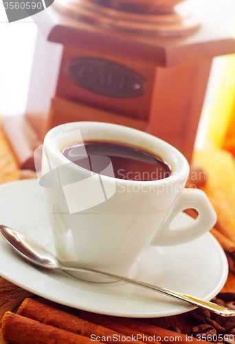 Image of Fresh aroma coffee in the white cup, coffee and cinnamon