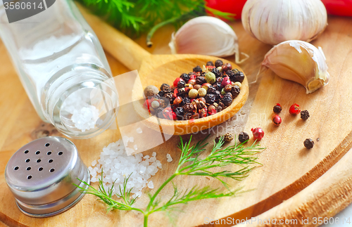 Image of Aroma spice in the wooden spoon, spice and salt