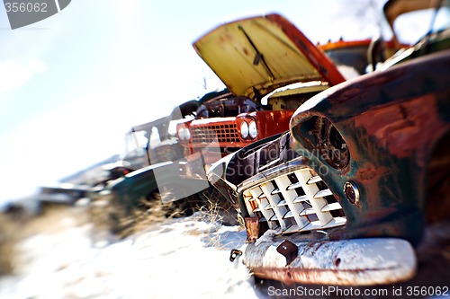 Image of old cars at junkyard