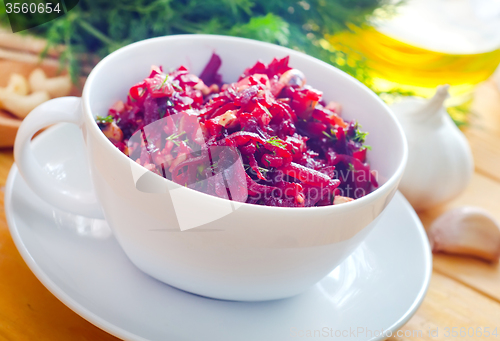 Image of Fresh salad with beet and walnuts, vegetarian salad