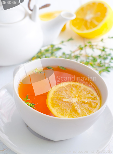 Image of Fresh tea with lemon in the white cup