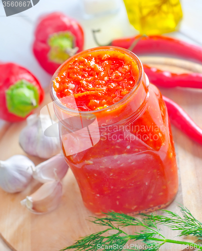 Image of Fresh chilli sauce in the glass bank