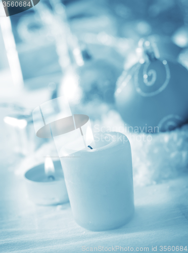 Image of Candle and christmas decoration