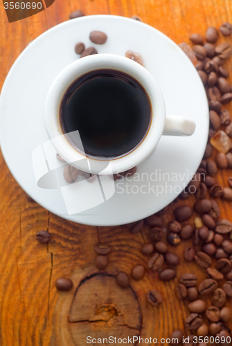 Image of Fresh aroma coffee in the white cup, coffee and cinnamon