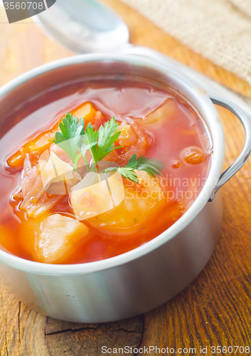 Image of Delicious veal stew soup with meat and vegetables 