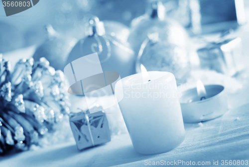 Image of Candle and christmas decoration