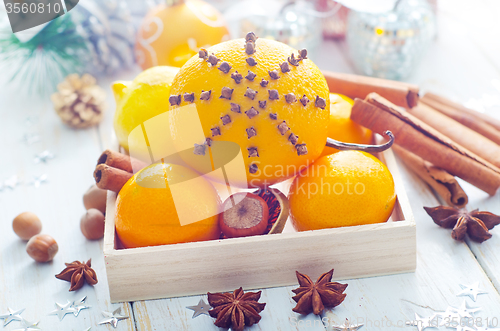 Image of Fresh oranges and cinnamon for christmas