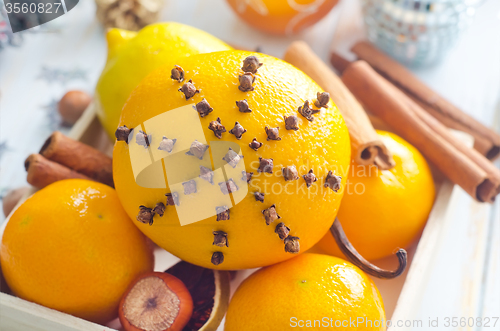 Image of Fresh oranges and cinnamon for christmas