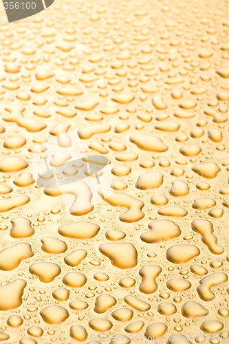 Image of water drops background golden