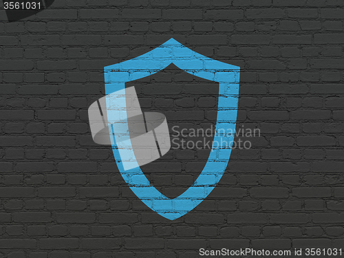 Image of Privacy concept: Contoured Shield on wall background