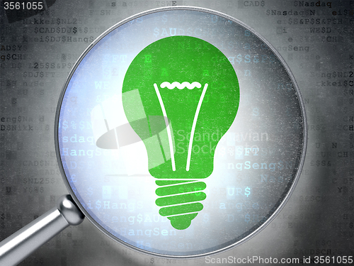 Image of Business concept: Light Bulb with optical glass on digital background
