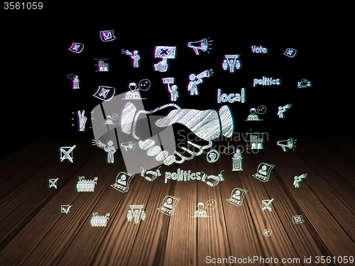 Image of Political concept: Handshake in grunge dark room