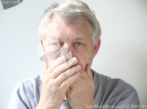 Image of man worried about his bad breath