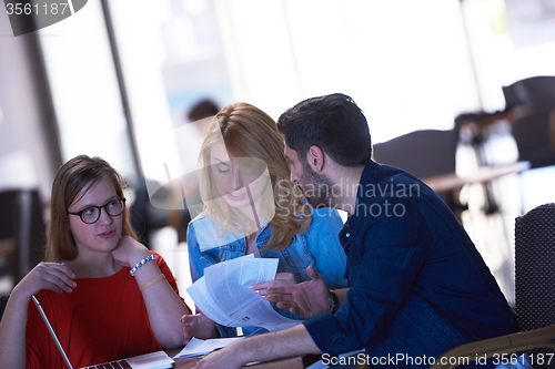 Image of students group working on school  project  together