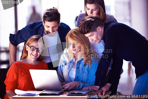 Image of students group working on school  project  together