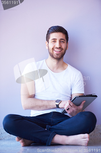 Image of student working on tablet