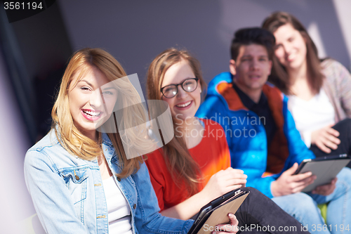 Image of students group working on school  project  together
