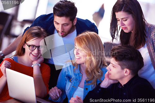 Image of students group working on school  project  together