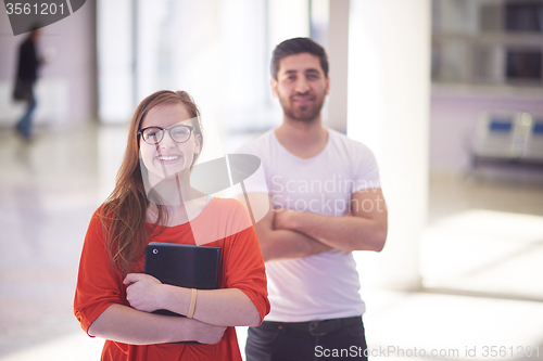 Image of students couple standing together