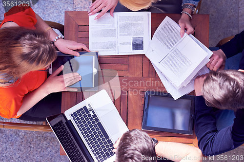 Image of students group working on school  project  together