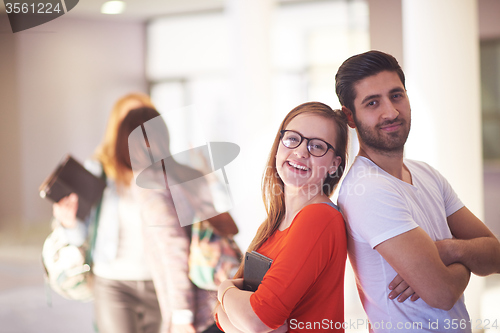 Image of students couple standing together